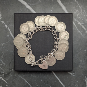 Vintage Sterling Silver Charm Bracelet With Heart Locket and Coin Charms